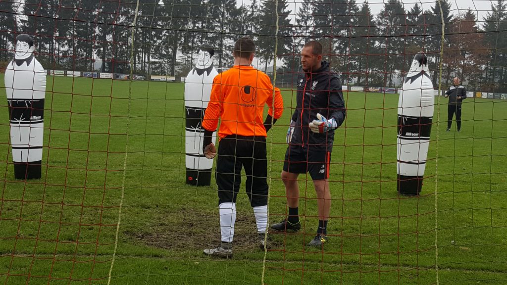 Coach Achterberg on the field